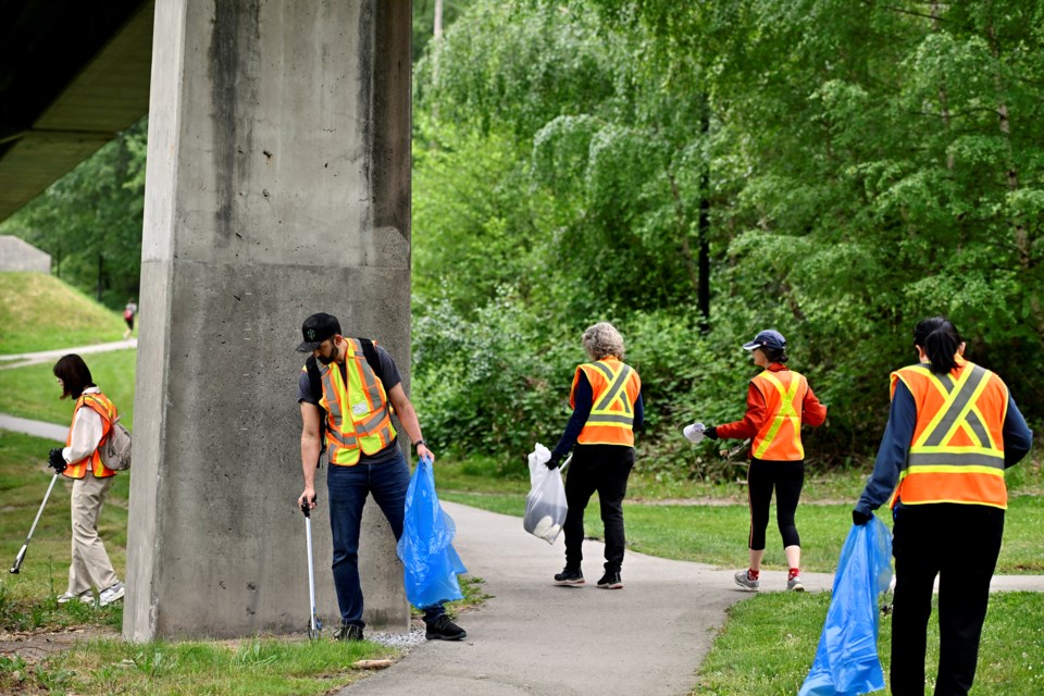 Volunteers clean litter in areas surrounding Ron McLean park.