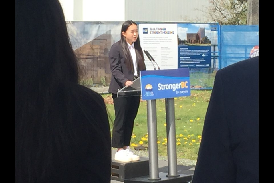 Shian Corbeil, a financial planning diploma student at BCIT, speaks about her experience with dorm living at a celebration of the school's impending student housing, the first in nearly 40 years, at BCIT on April 14.