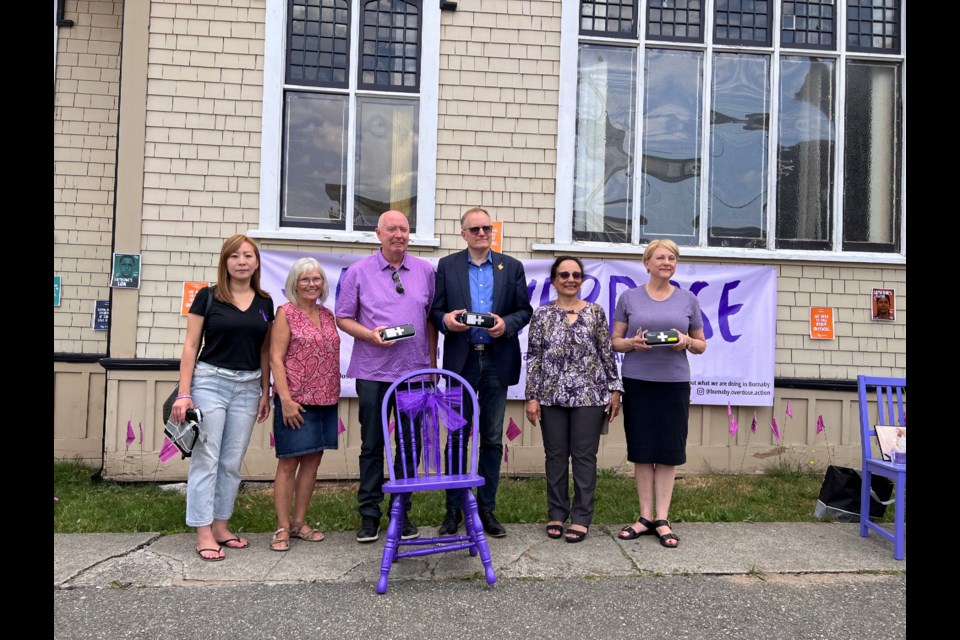 Burnaby community members hold vigil in observance of International Overdose Awareness Day on Aug. 31, 2022.