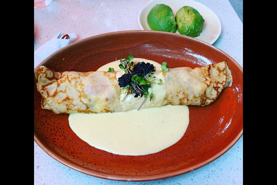 A lobster and shrimp crepe with caviar.