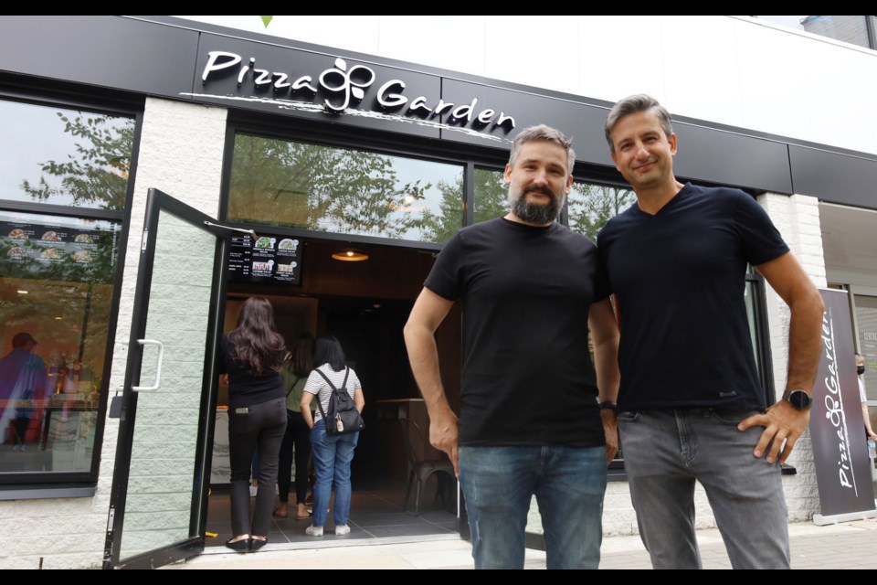Brothers Logan and Kubi Eren are the franchisees of Burnaby's newest pizza joint, Pizza Garden, at Lougheed Mall.