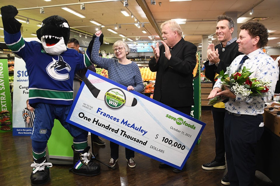 Burnaby resident Frances McAuley won $100,000 after a four-goal game by Canuck Brock Boeser in Save-On-Food's Score and Win contest.