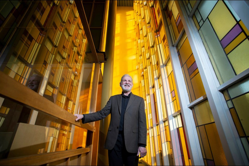 This shot of Rev. Blair Odney at Queens Avenue United Church won third place for Best Feature Photo at the Canadian Community Newspaper Awards — one of five honours for photographer Jennifer Gauthier.