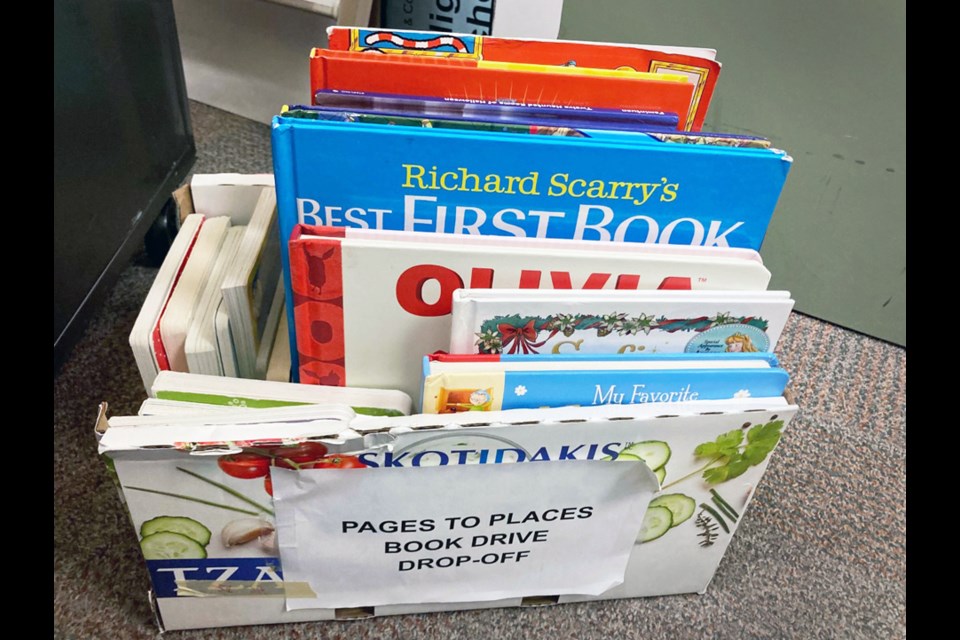 A Pages To Places book donation bin is stuffed with books that will be sent  to Vietnam.