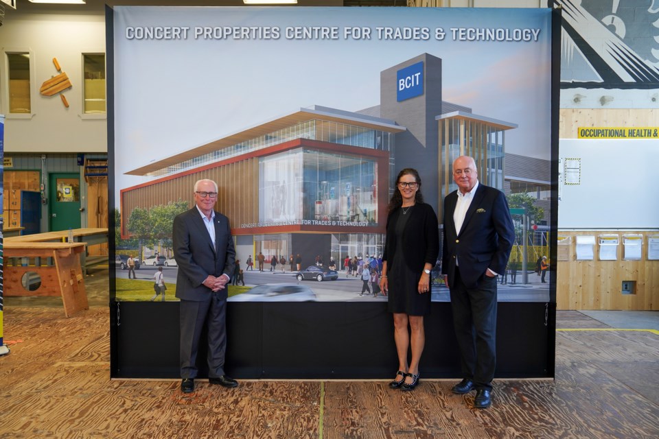 David Podmore (left), co-founder and CEO of Concert Properties, at the unveiling of the name of BCIT's trades and technology building.