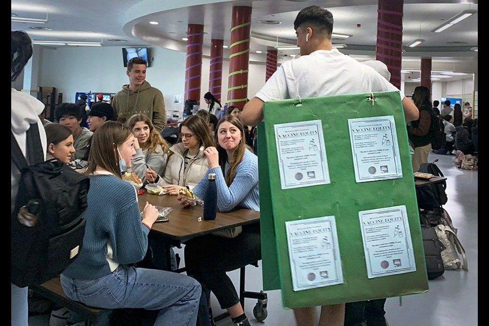 Armaan Hehar, a member of Burnaby South Secondary's B.C. championship-winning basketball team, uses his star power to raise awareness about global vaccine equity at Burnaby South Secondary School.