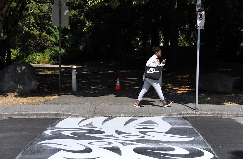 Burnaby's first reconciliation crosswalk was installed on Union Street by the Drummond’s Walk Urban Trail Friday morning.