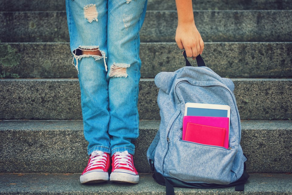 School student with backpack