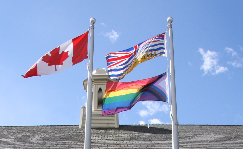The Pride flag flies above the Burnaby school district office for the first time Monday.