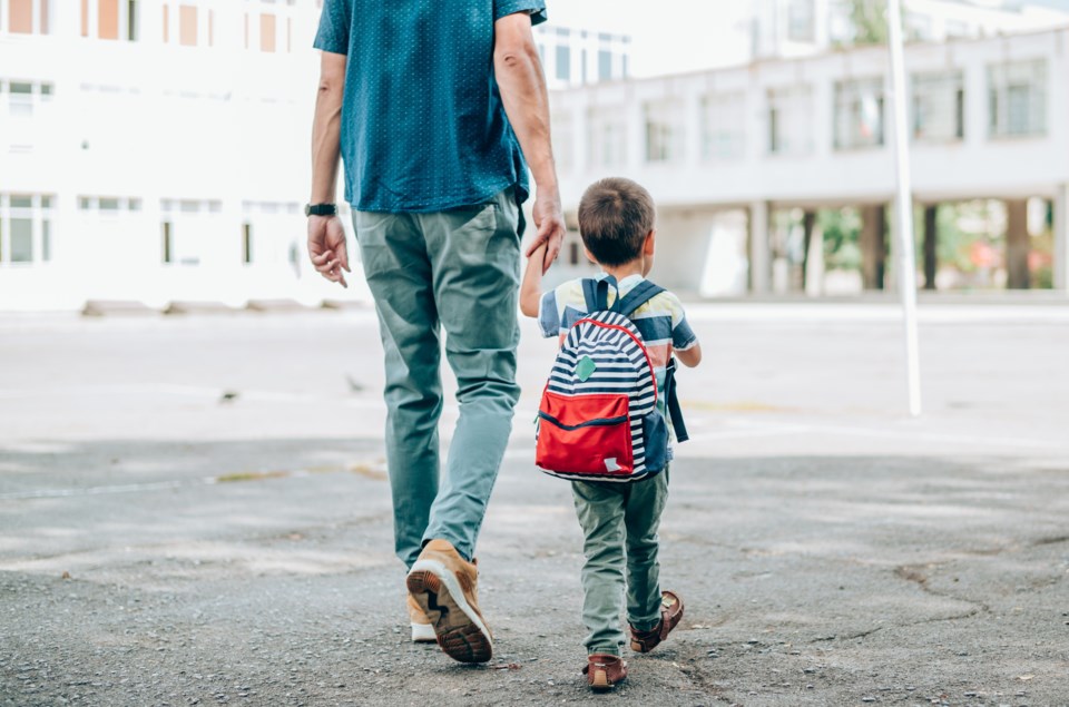 Young Student With Parent