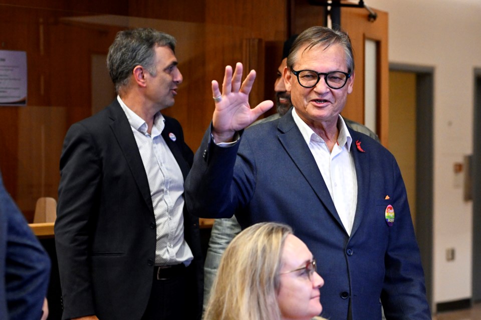 Chuck Puchmayr arrives at city hall on election night. Puchmayr is bidding farewell to politics after his unsuccessful bid for the mayor's chair.