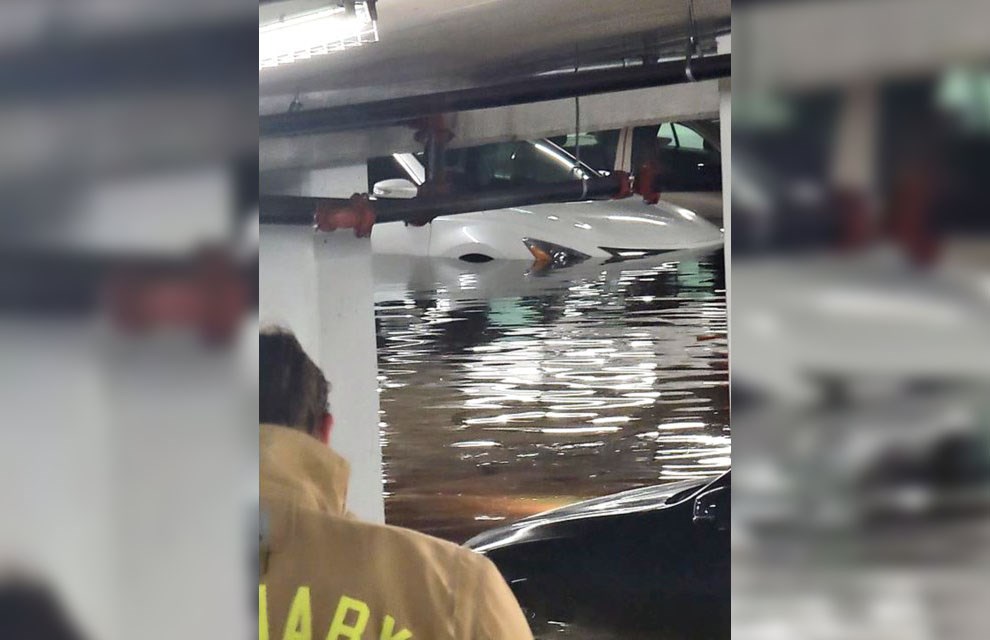 Burnaby condo on 'fire watch' after parkade floods due to water-main break