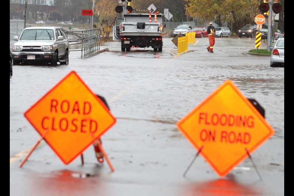 Roads in the Quayside neighbourhood were flooded in November 2021 after an atmospheric river swept through the region. The city is currently updating its flood resilience plan with a focus on how climate change is causing rising water levels in the Fraser River.
