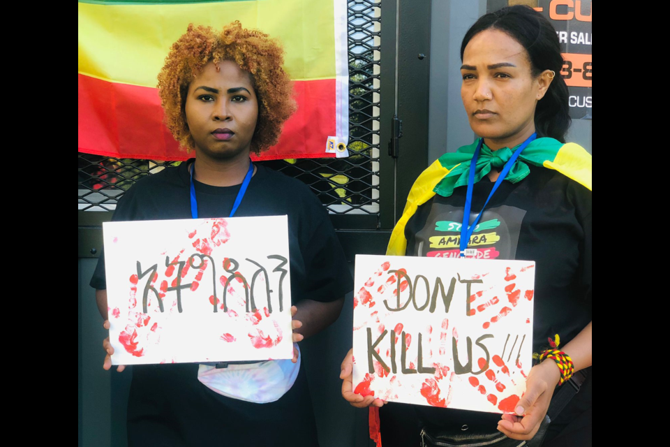 A group gathered at Civic Square in Burnaby to remember the massacre of over 200 ethnic Amhara in Ethiopia that happened earlier this month.