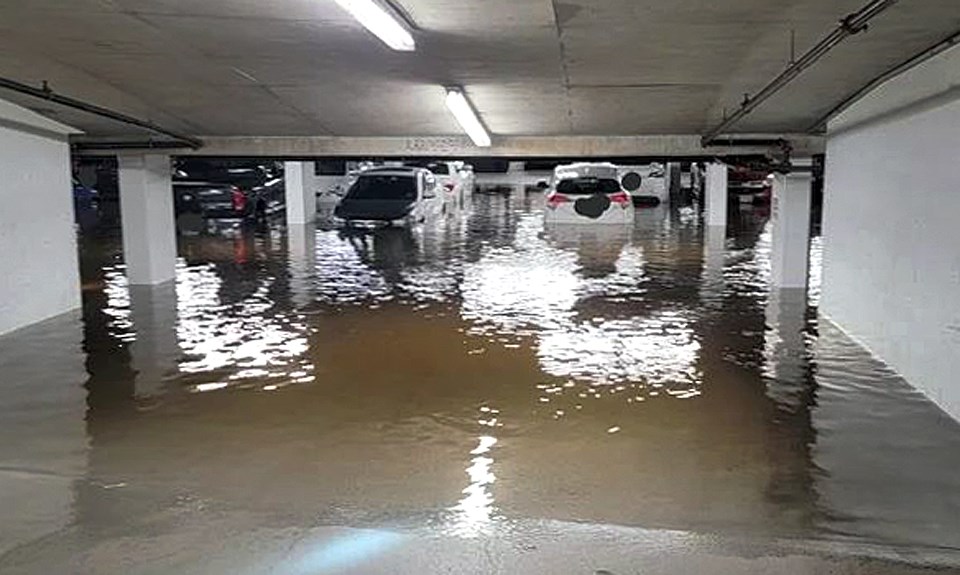 Photos of the flooded parking garage at 4118 Dawson St. were posted on Reddit.