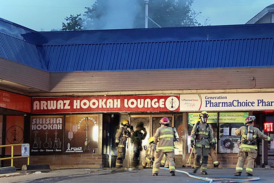 Burnaby firefighters respond to a fire at Arwaz Hookah Lounge at 6th Street and 12th Avenue.