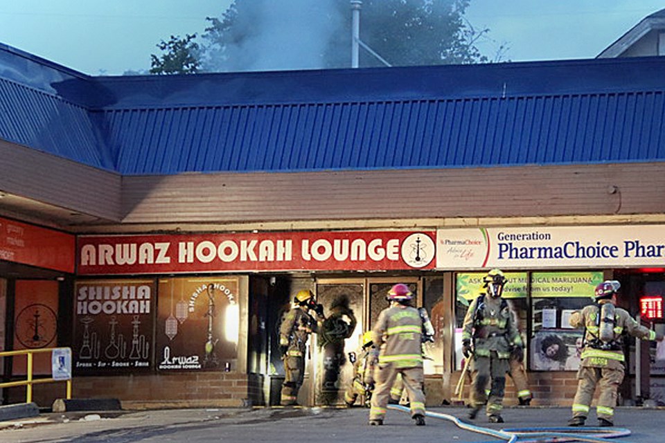 Burnaby firefighters respond to a fire at Arwaz Hookah Lounge at 6th Street and 12th Avenue.