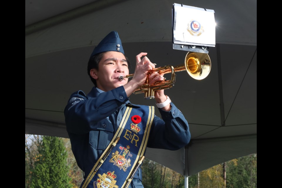Flight Sergeant Evan He plays the trumpet at the North Burnaby Remembrance Day ceremony.
