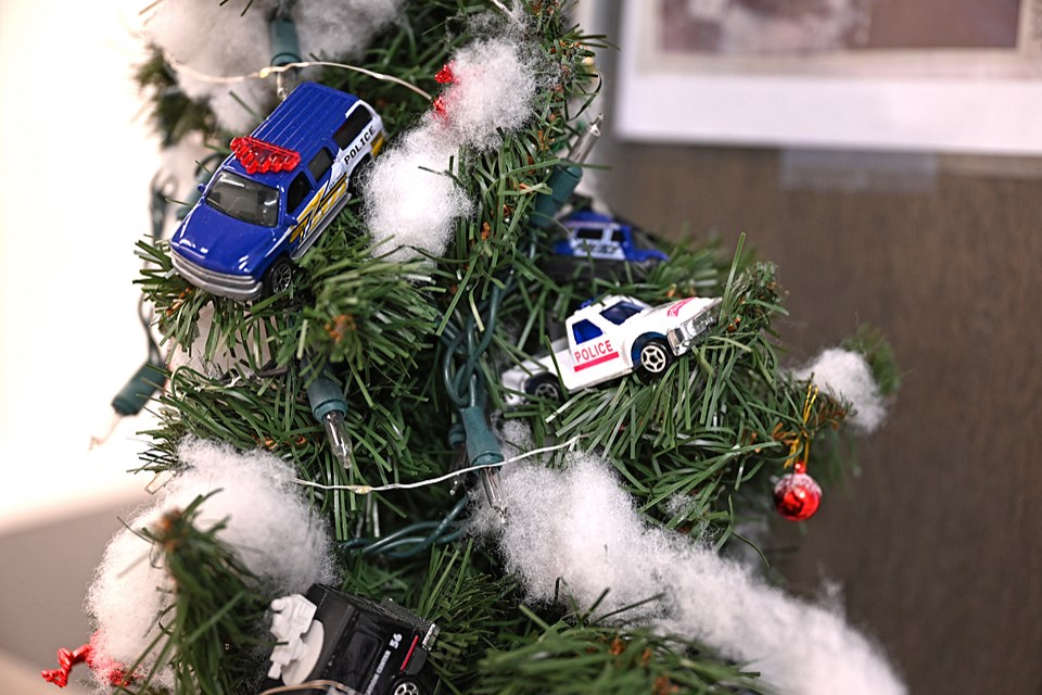 Burnaby RCMP got this tiny Christmas tree and an encouraging letter 20 years ago. Both are on display at the detachment every holiday season.