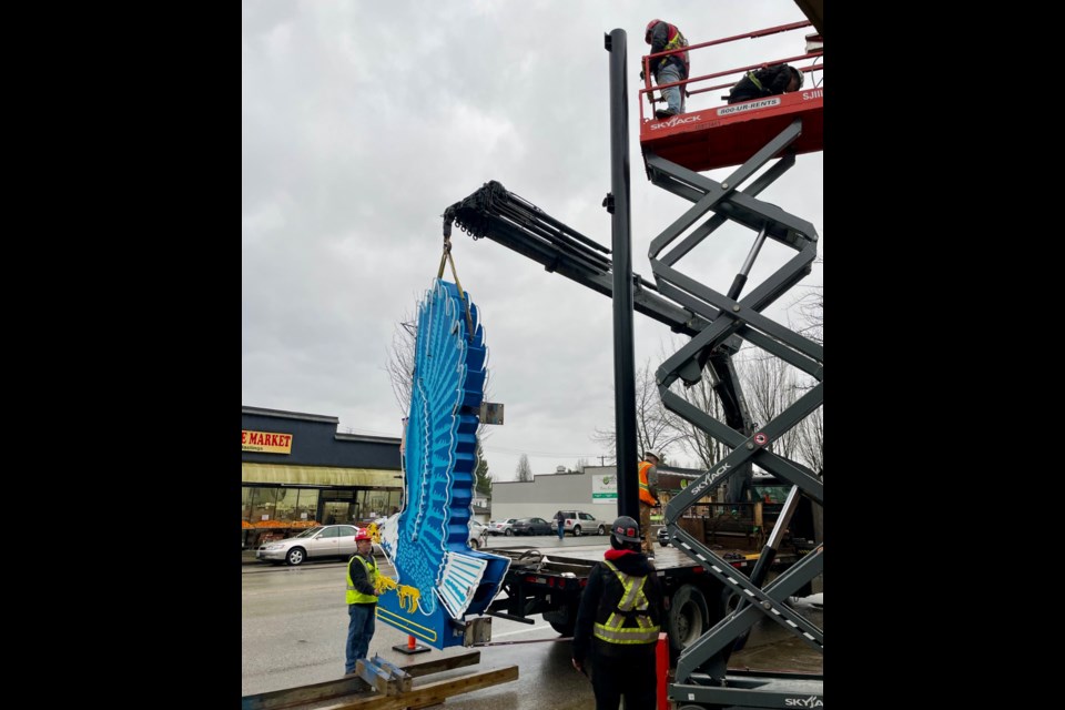 The iconic Ford Eagle neon sign was reinstalled in its original location on Hastings Street in December. 