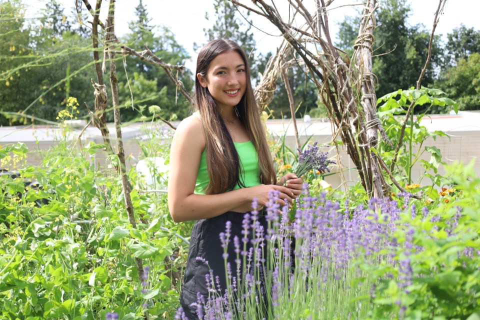Newly graduated Burnaby Mountain Secondary student Casey Lo has won the city's youth environmental award for her stewardship and leadership with school garden projects.