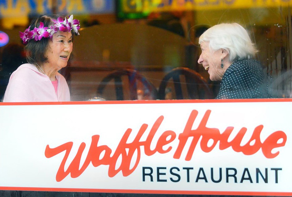  Susan Chew, left, and Verla (Staples) Thompson catch up during a surprise 90th birthday party in 2017 for Chew at the Waffle House, a restaurant she founded in 1955. In 1956, the two former roommates were at the centre of a media fire storm about racism in the Royal City.
