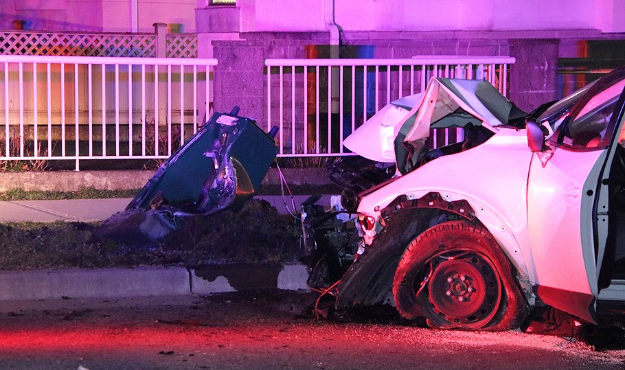 Police respond to a single-vehicle crash near the intersection of Gilmore Avenue and Georgia Street Tuesday night. 