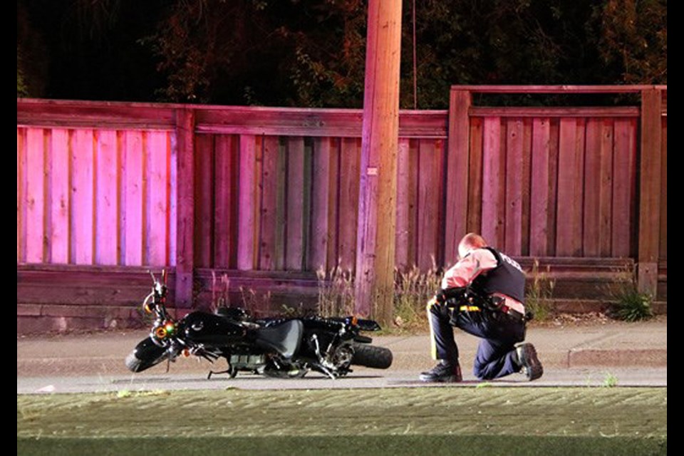 Police investigate a hit-and-run at Canada Way and Imperial Street that killed motorcyclist James "Mark" Peters in June 2021.