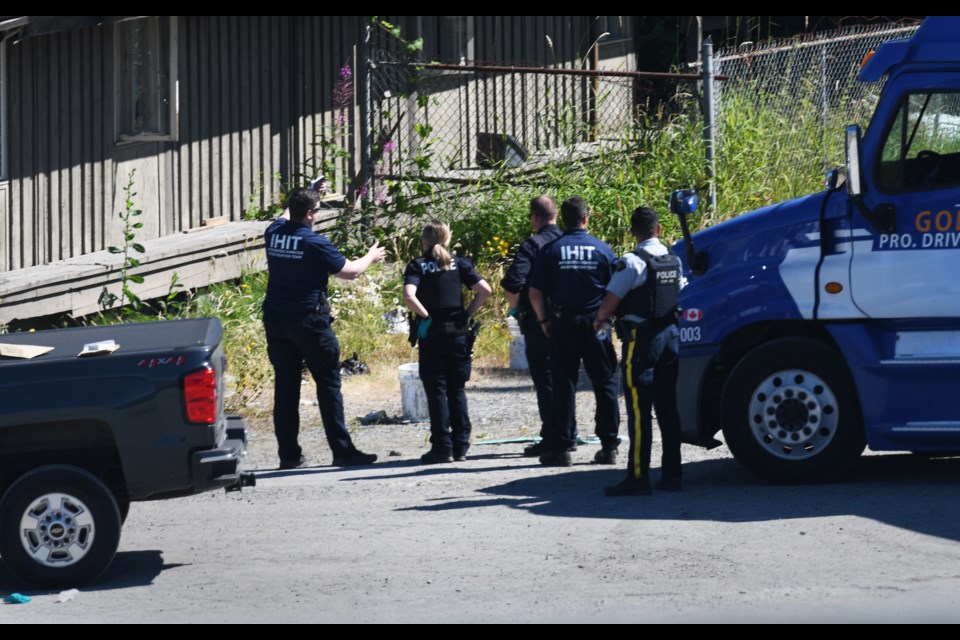 Homicide investigators are on scene at a gravel lot on Norland Avenue near Laurel Street where a man's body was found Thursday.