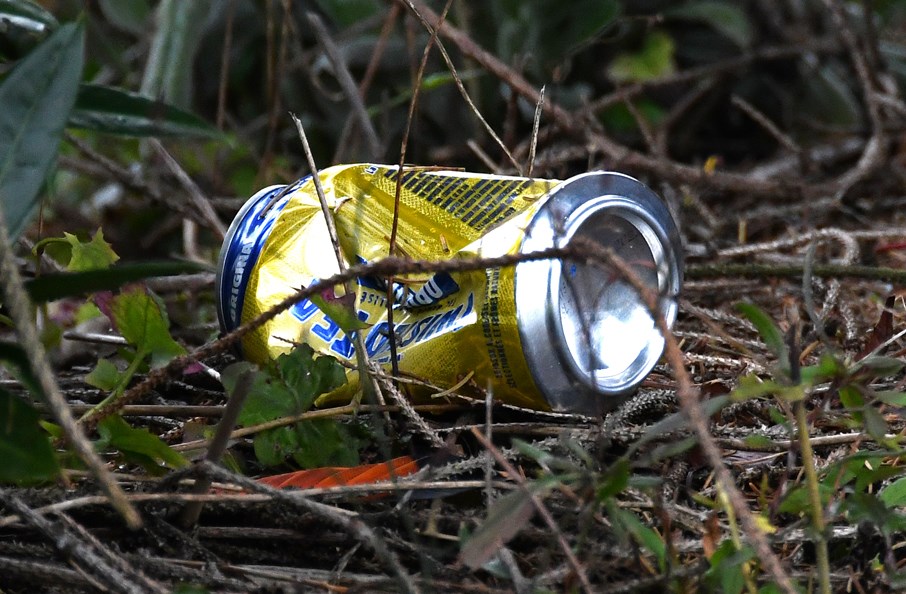 A discarded TwistedTea can lies  outside a North Burnaby house that has become notorious for big, loud parties on a quiet residential street. 