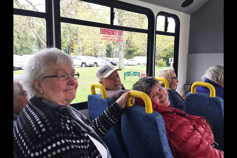Seniors living at the Swedish Canadian Assisted Living Residence enjoy a trip to Stanley Park on their bus in 2018.