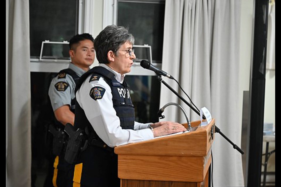 Burnaby RCMP Insp. Kathy Hartwig addresses residents at the Lions Mulberry Place housing complex Monday.