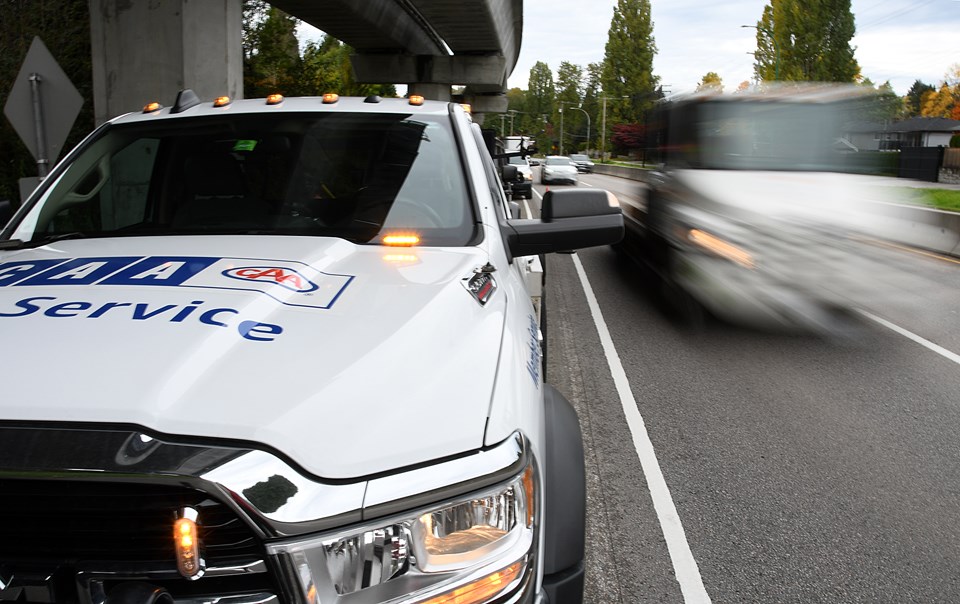 Police were at Lougheed Highway pulling over drivers who failed to slow down by a BCAA tow truck set up next to the highway with lights flashing.