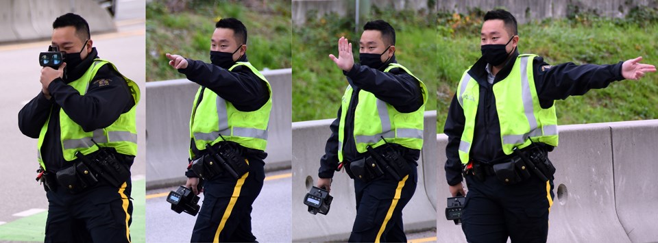 Burnaby RCMP traffic officer Const. Brian Lee  pulls over vehicles for speeding past a tow truck set up beside Lougheed Highway.