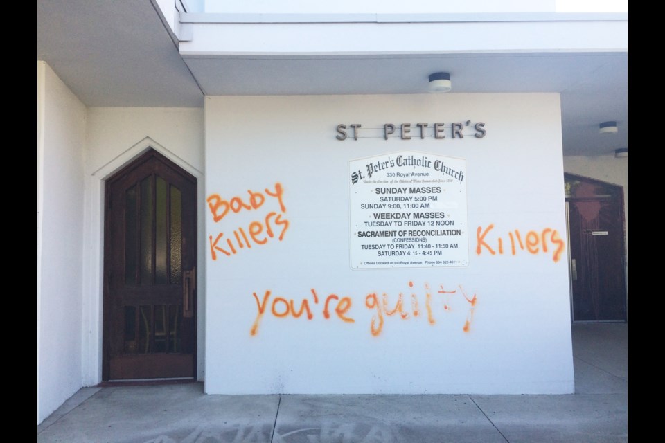 St. Peter's Roman Catholic Church, at Royal and Fourth, was hit by orange spraypainted graffiti and splattered paint over the weekend, in a clear reference to the ongoing discovery of unmarked graves at residential schools.