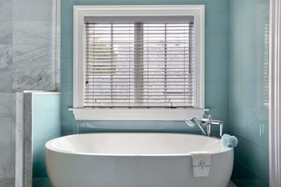 Faux wood blinds by Greystone Blinds.