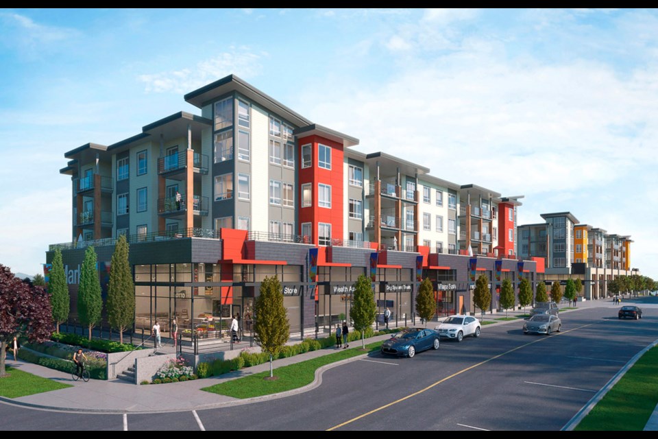 The Hamilton Village building is accentuated with modern steel and glass awnings, cement cladding, and winding walkways. Photo Supplied.