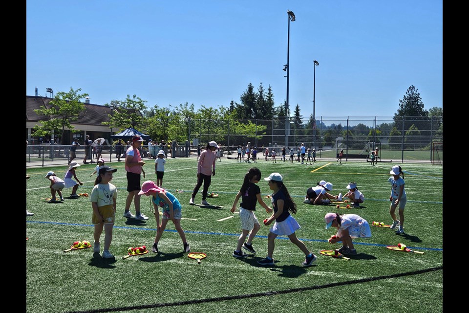 More than 50 young girls signed up to try their hand at three outdoor sports at Burnaby Lake Sports Complex West on July 7, 2024, including tennis.