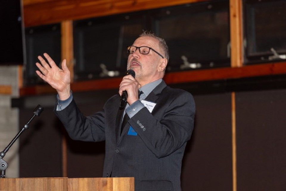 Sportscaster Don Taylor speaks at the 21st Burnaby Sports Hall of Fame ceremony as its first-ever media personality inductee.