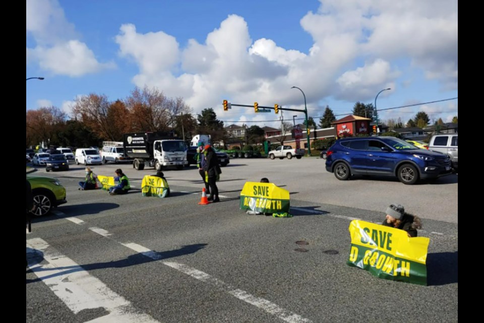 Save Old Growth blocked the intersection of Boundary Road on Grandview Highway on April 27, 2022. 