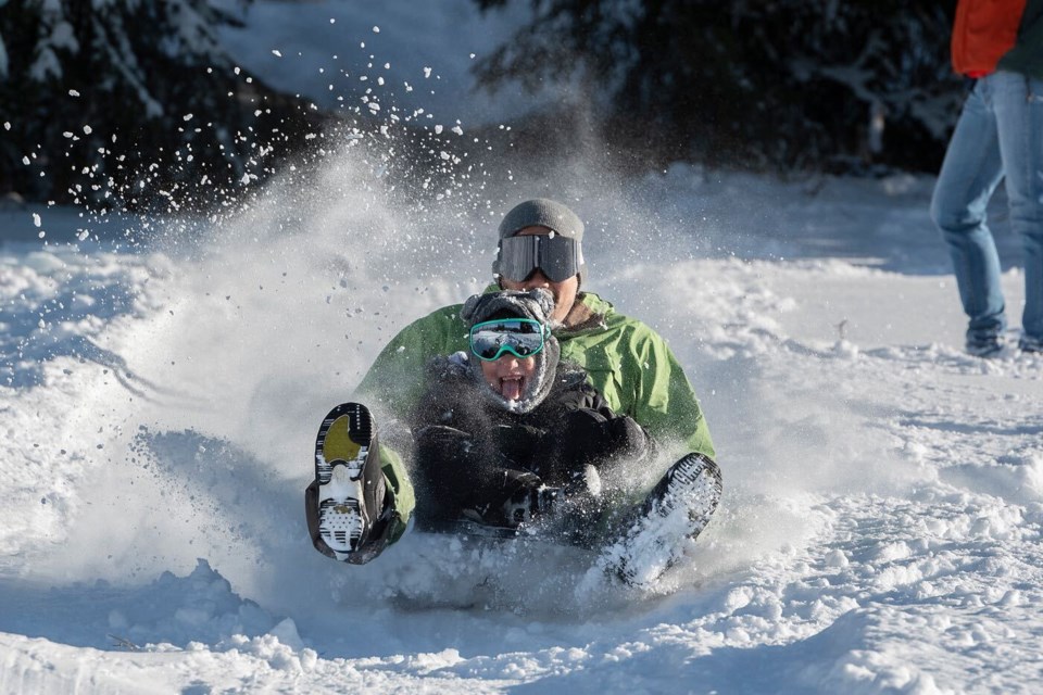 Burnaby residents broke out the toboggans on Burnaby Mountain after a recent snowfall. 