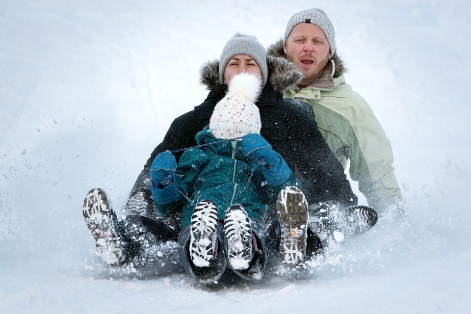 New Westminster residents broke out the toboggans at Queen's Park after a recent snowfall. 