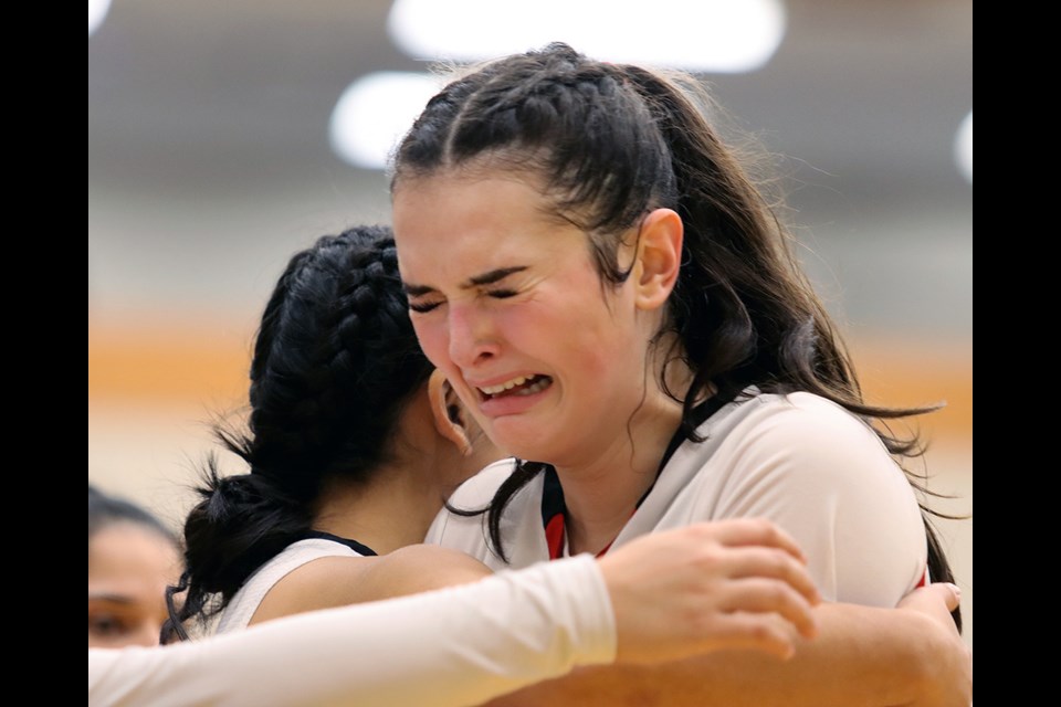 Burnaby Central Wildcats Sophia Morton reacts after her team's 58-46 loss to the Riverside Rapids in Friday's semi-final at the BC AAAA high school girls basketball championships at the Langley Events Centre.