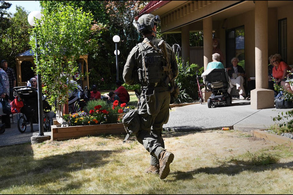 Tactical response: Residents of the Lions Moody Park Tower were evacuated Friday as police dealt with a man in mental health crisis. Photo Cornelia Naylor 