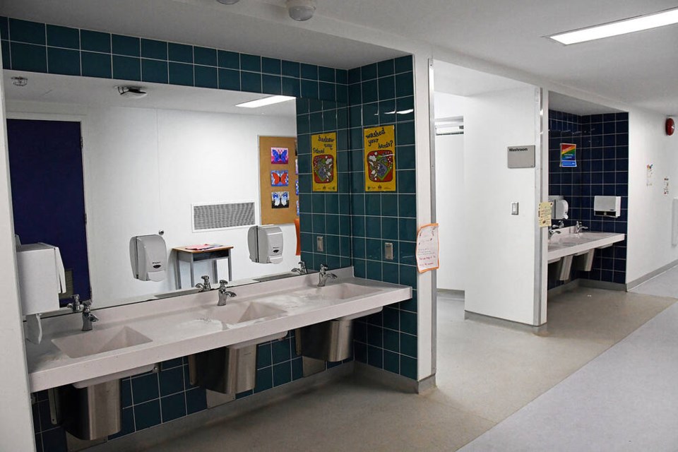 The future: Mirrors and sinks are located in the hallway and cubicles in the washroom are used by all genders in Parkcrest Elementary School's new universal washrooms. Photo Cornelia Naylor 