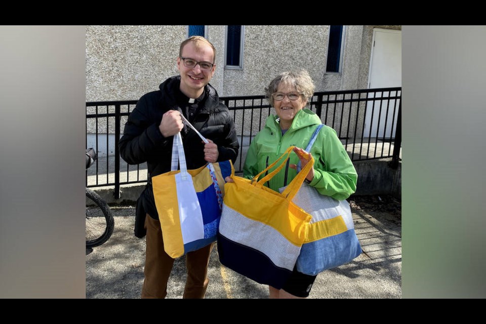 For a cause: Joanne Morneau donated bags sewn by the Fabric Bag Solutions group to New Westminster's Holy Eucharist Ukrainian Catholic Cathedral for fund-raising for Ukraine.
Photo Germain Morneau 