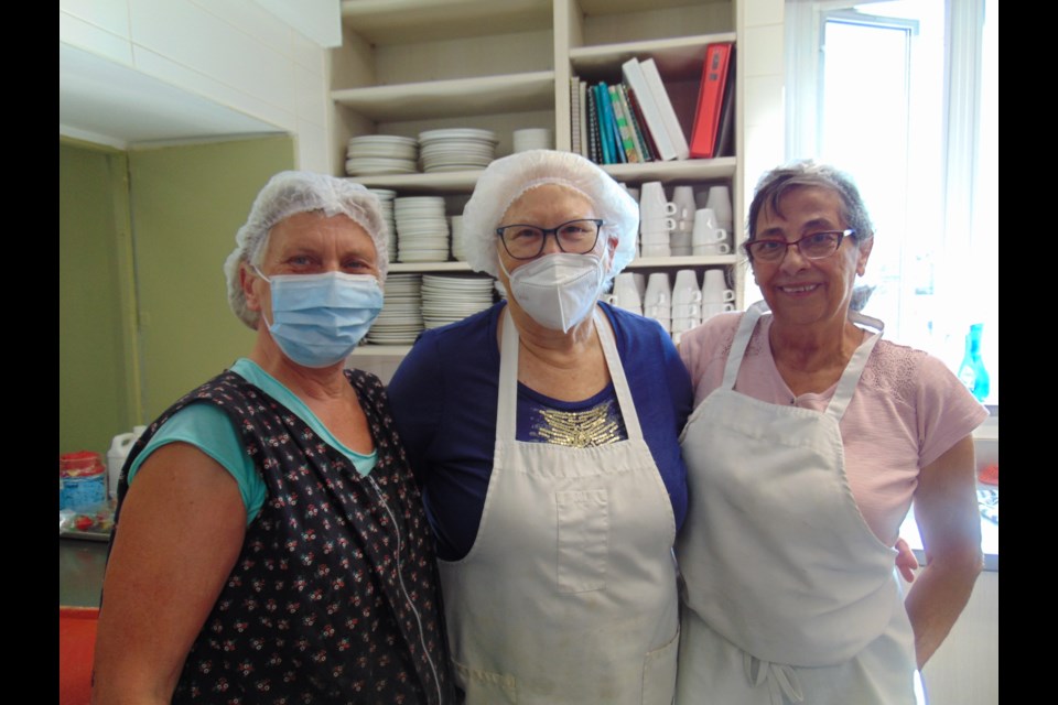 (left to right) Trinity Community Table volunteers, Susan O'Brian, Helen Martin, and Paulette Legacy.                               