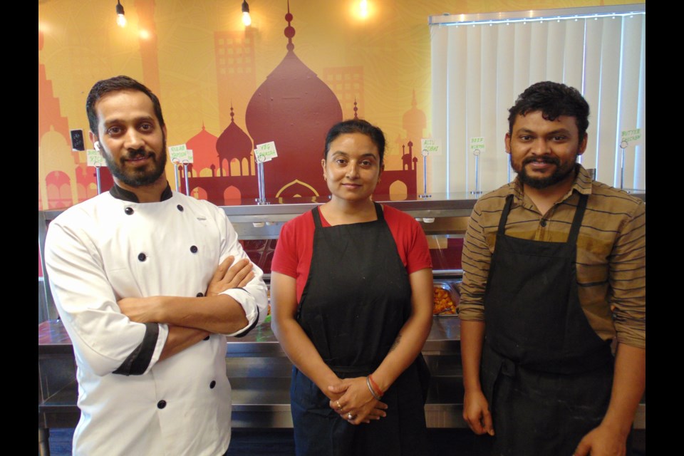 (left to right) Chef Rajesh Kumar, Sumandeep Kaur, and Mitesh Patel from Namaste London Bar and Grill in Cambridge.                               