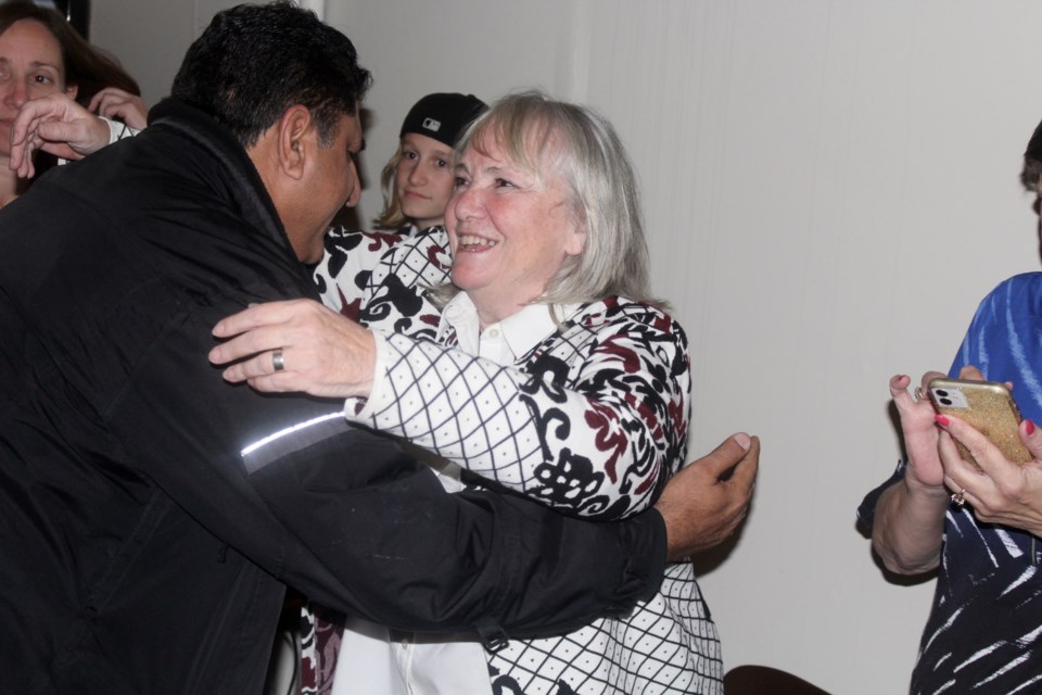 New mayor of Cambridge Jan Liggett celebrates with her supporters at her campaign office on Main Street.