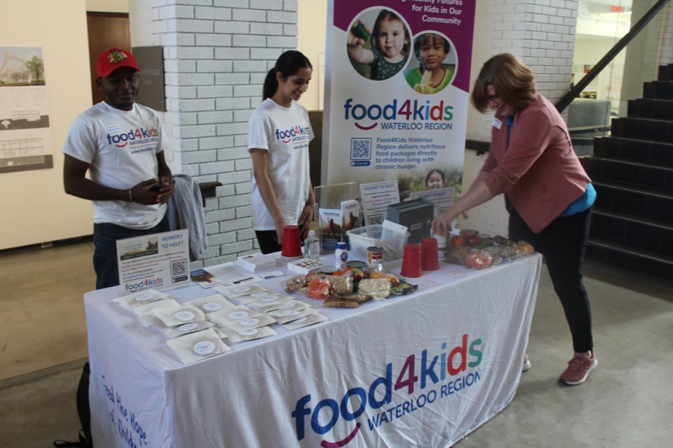 Food4Kids set up a booth at the Hunger Forum to educate those in attendance about its services.